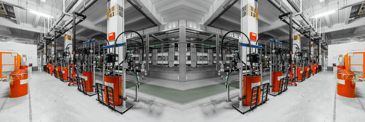 Production concept, factory premises. Copy space. Wide panoramic image.