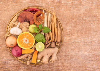 Plants, fruits, vegetables and herbs antiviral and immunity such as ginger, turmeric and more on an old wood background.