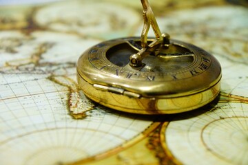 old compass on a map