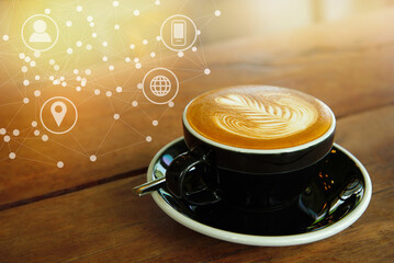 cup of black hot coffee drink on wood table cafe with morning light and connection sign background