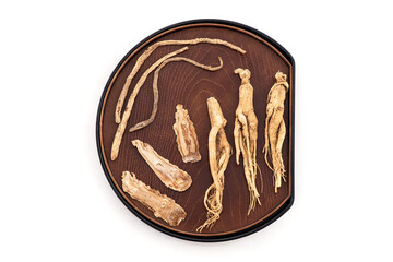 Ginseng ,chinese angelica, and salvia miltiorrhiza isolated on white background.
