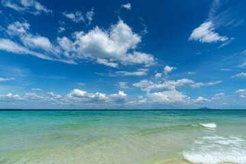 Crystal sea and blue sky background. Tropical beach.