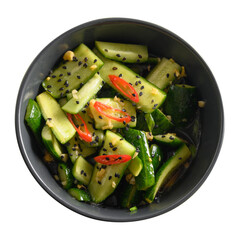 Asian Broken Cucumber with coriander, ginger, cashew nut, chili pepper , black vinegar in black bowl isolated on white background. Spicy cucumbers. Popular Chinese appetizer. Top view.