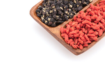 Goji berry and black wolfberry seeds isolated on white background.top view,flat lay.