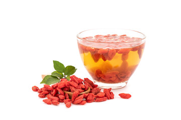 Goji berry seeds and tea isolated on white background.