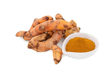 Turmeric rhizome and powder isolated on white background with clipping path.