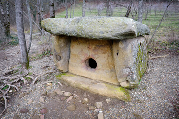 View of dolmen in Pshada river valley on cloudy winter day. Krasnodar Krai, Russia.