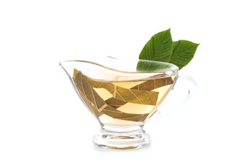 Kratom or Mitragyna speciosa and tea isolated on white background.