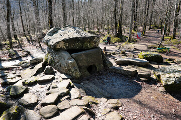 Obraz premium View of ancient dolmen in Zhane river gorge on sunny winter day. Krasnodar Krai, Russia.