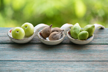 Terminalia bellirica , terminalia chebula and phyllanthus emblica on nature background.
