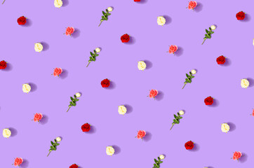 Romantic background idea. Red, pink and white roses on a pastel purple background.