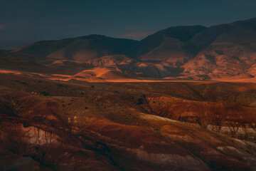 Sunrise in the red mountains. Altai, Kyzyl-Chin valley, also called Mars.
