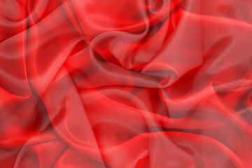 Red silk or satin luxury fabric texture abstract background.