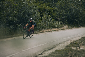 Fototapeta na wymiar Sportsman spending leisure time for cycling outdoors