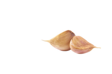 unpeeled cloves garlic isolated on white background.