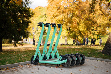 Green transportation. Electric scooter new way city mobility. Sustainable climate neutral cities goals. Green mobility sustainable transportation © Girts