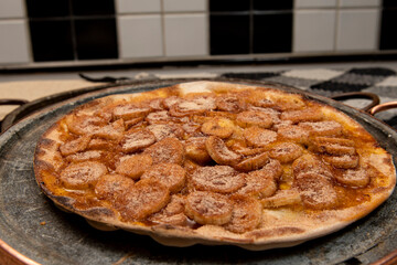 Sweet Brazilian pizza with banana, cinnamon and sugar