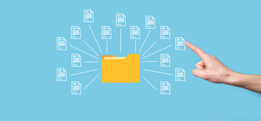 Document Management System DMS .Businessman hold folder and document icon.Software for archiving,...