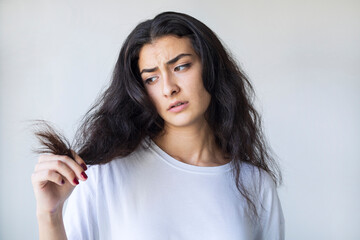 Woman have damaged and broken hair, loss hair, dry problem concept.	
