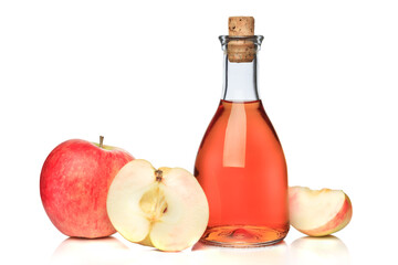 Bottle of apple cider and red apples isolated on white background.