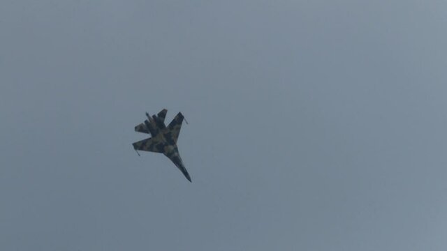 Sukhoi Su-35 multipurpose fighter aircraft (Flanker-E) performs aerobatics. Close-up. Zhukovsky, Russia, August 10, 2012. 
