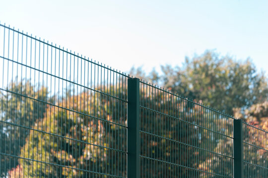 Texture of cradled metal or synthetic mesh on the fence for backgrounds