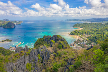 Fototapeta premium Bacuit Bay view from Taraw Cliff, El Nido Palawan. Rocky mountain trropical landscape over azure sea. Aerial drone view.