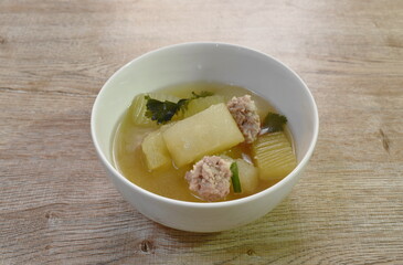boiled winter melon with chop pork soup on bowl 
