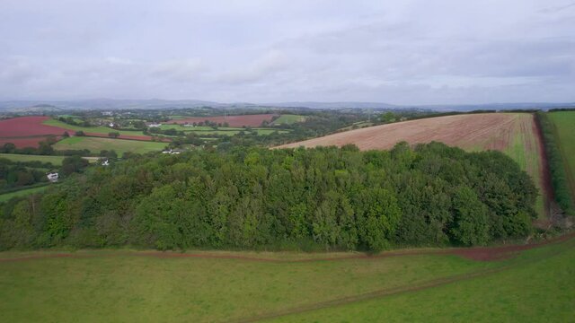 Fields over Compton Castle from a drone, Compton, Devon, England, Europe
