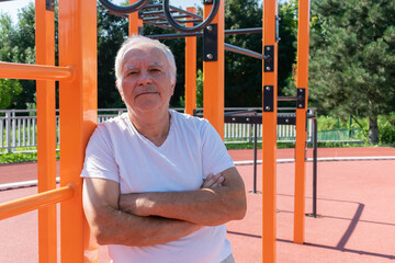 Safe Outdoor Exercises Older Adults senior man male summer, street workout physical Strength activity Calisthenics Park