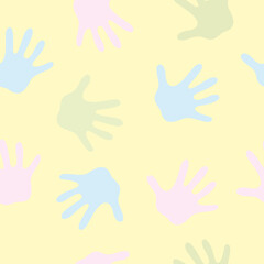Obraz premium Pattern baby hands pink blue and green on yellow background