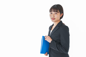 笑顔のスーツを着たビジネスウーマン