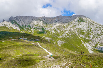 Naklejka premium 01_Wide panorama to Latemar Group- 2846 m and Chalet Torre di Pisa , Dolomiti Italy.