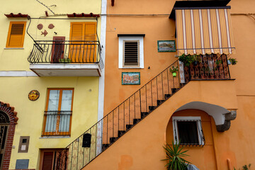 colored facade of a building in Ischia