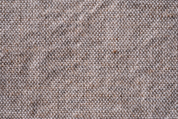 Close-up of calm and emotional pure cotton cloth in gray and brown color