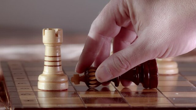 The player places the king on the chessboard. The game is over. Check and checkmate. King is defeated.