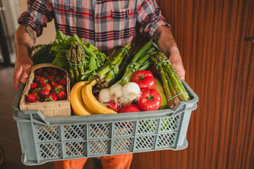 Man delivering fruit and vegetable box
