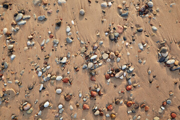 Fototapeta na wymiar Stones at Baltic sea shore in Liepaja, Latvia