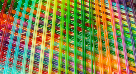 Background with colorful line design with plastic wires. Modern art.