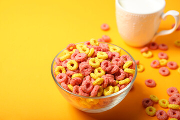 colored corn rings for breakfast on the table close-up