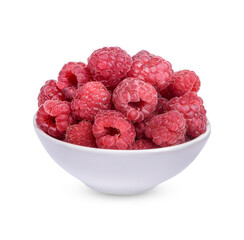 Fresh raspberry in a white cup with leaves isolated on white background