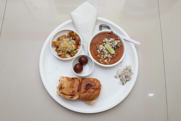 Beautiful and Tasty Pav Bhaji and Gulab Jamun. Favorite Indian Food.