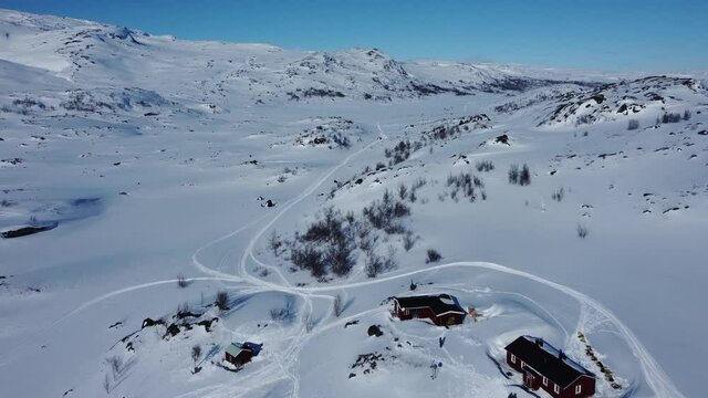 Aerial View Of Mountain Cabin In Sweden - STF Unna Allakas During Winter - drone shot