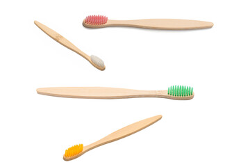 Bamboo toothbrush isolated on a white background.