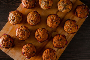 Muffins on a wooden cutting board. Traditional pastries for the holiday.