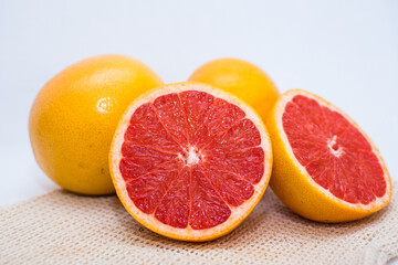 closeup of grapefruit cut in half, in summer, from the organic and healthy store