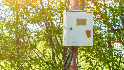 Electrical control box on a street. Outdoor Control switches and electrical switches. Gray hinged...