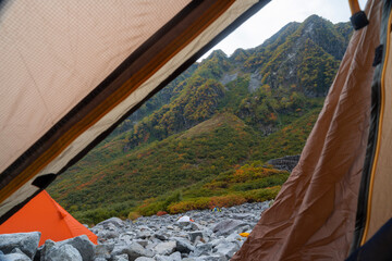 tent in the mountains © RYYYYYYYY