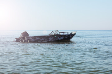 Motor boat at sea on sunny day
