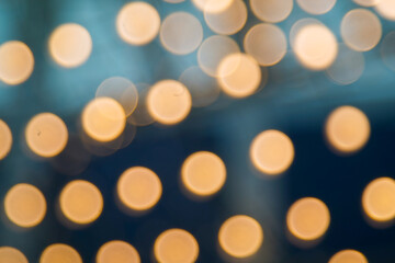 yellow bokeh lights on a blue sky